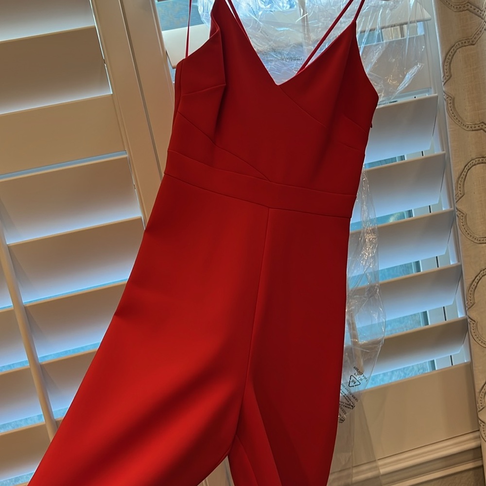 Likely red romper/jumpsuit